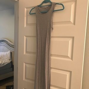 Gray form fitting dress with mid back cut out